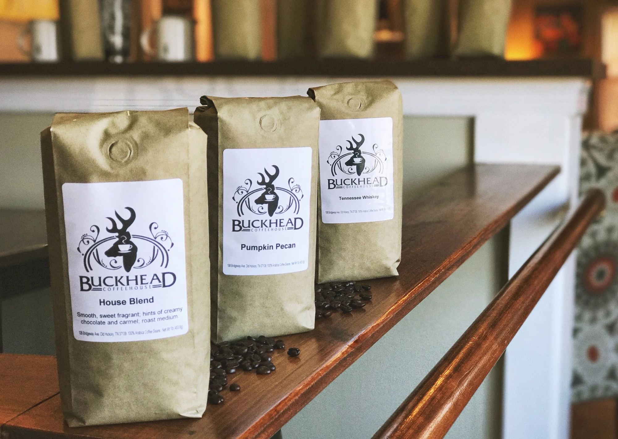 Three bags of Buckhead house coffee on the counter